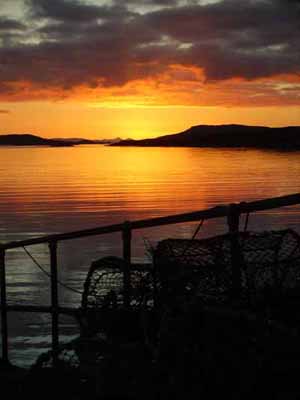 59 Sunrise over the Uists from Berneray